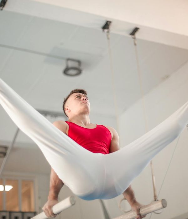Man performing a difficult balancing strength exercise.